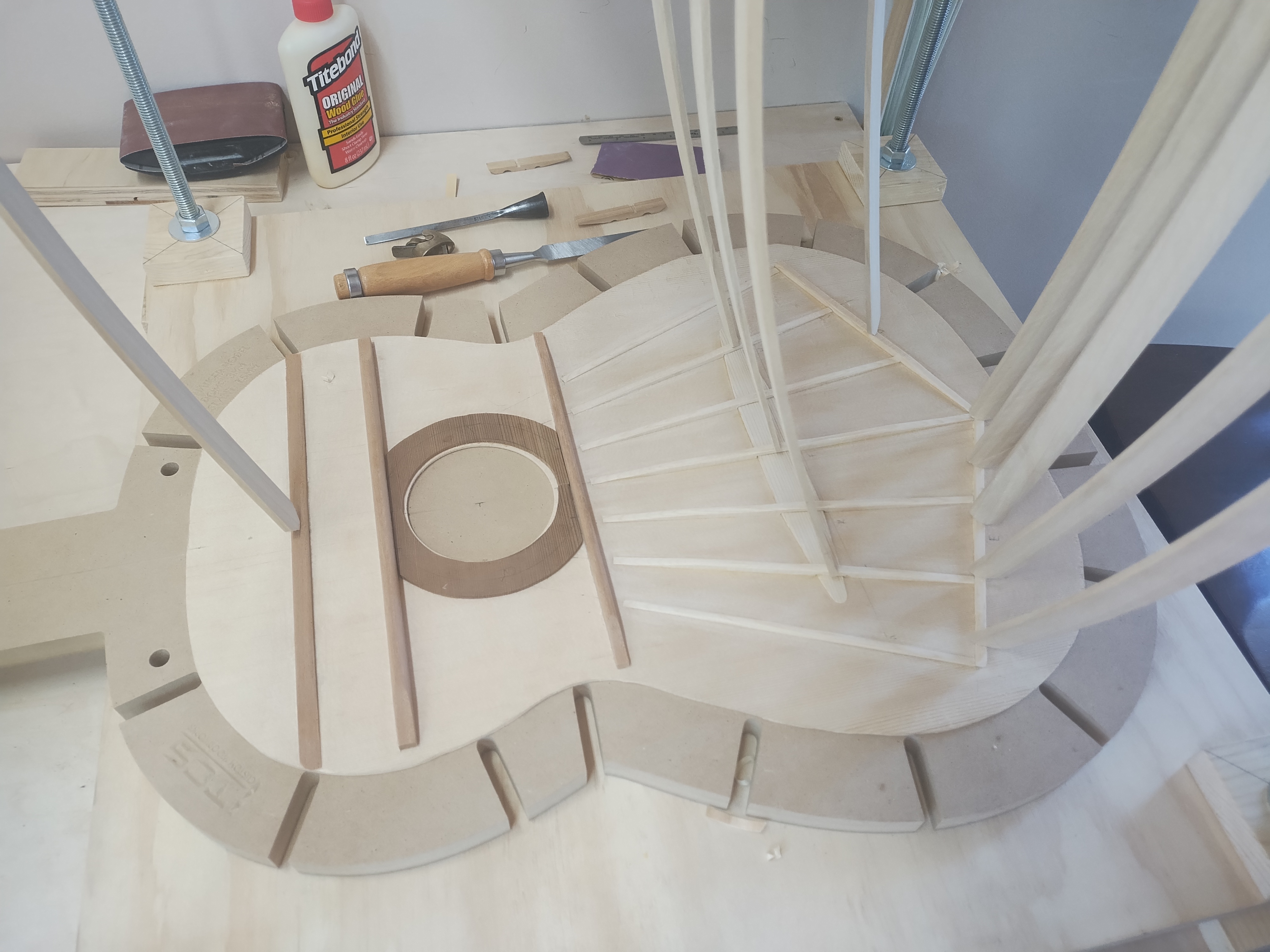 Hand-carved fan bracing for a custom classical guitar soundboard